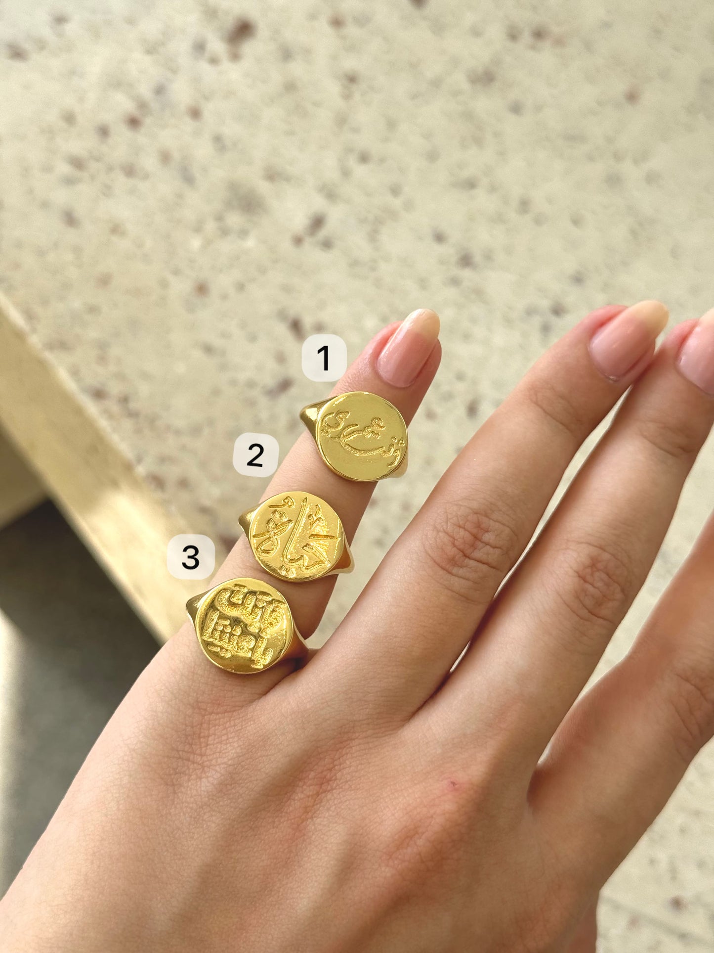 Named pinky rings